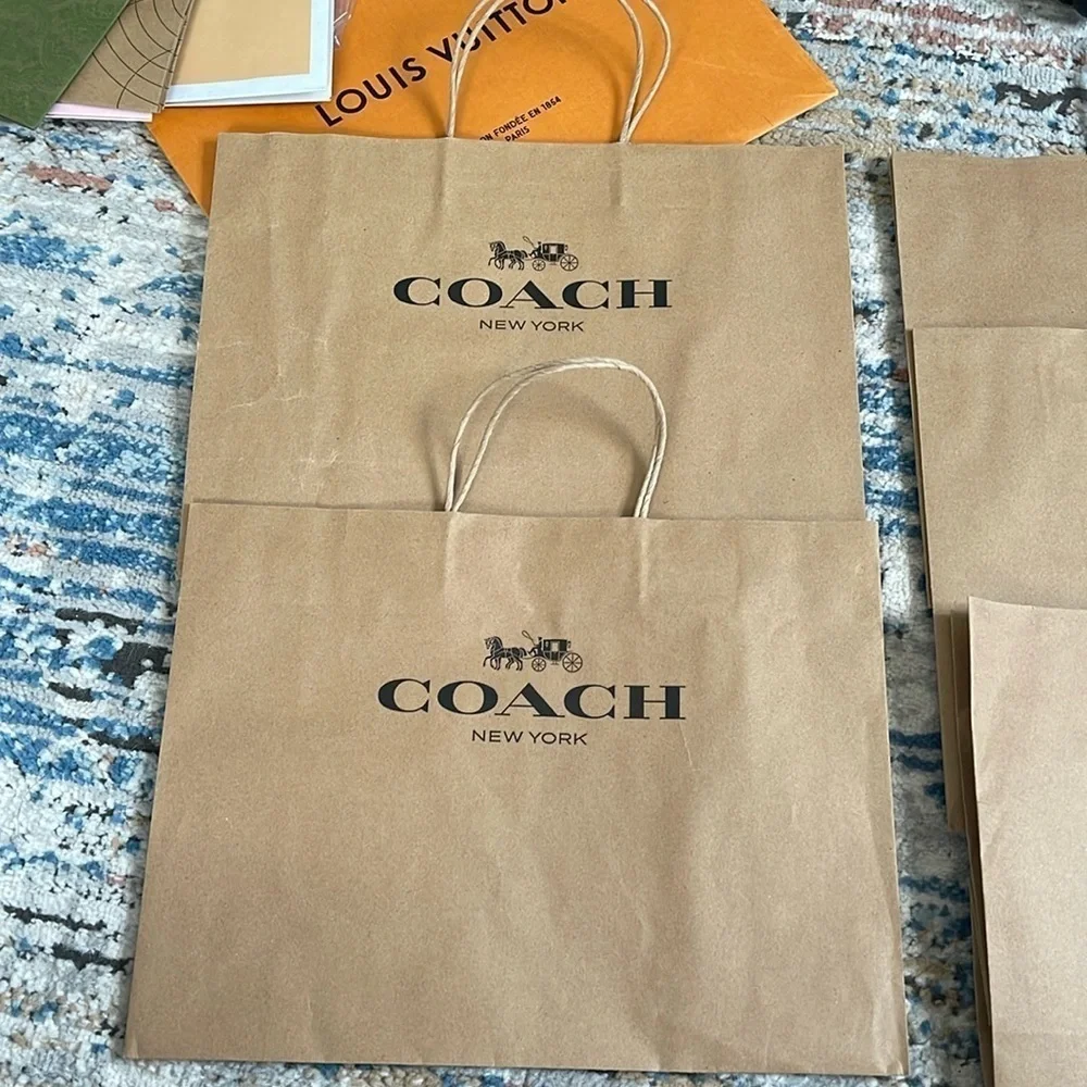 2 medium size coach shopping bags empty